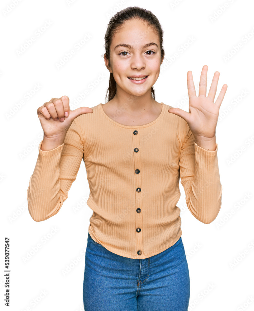 Beautiful brunette little girl wearing casual sweater showing and pointing up with fingers number six while smiling confident and happy. Beautiful brunette little girl wearing casual sweater showing and pointing up with fingers number six while smiling confident and happy.