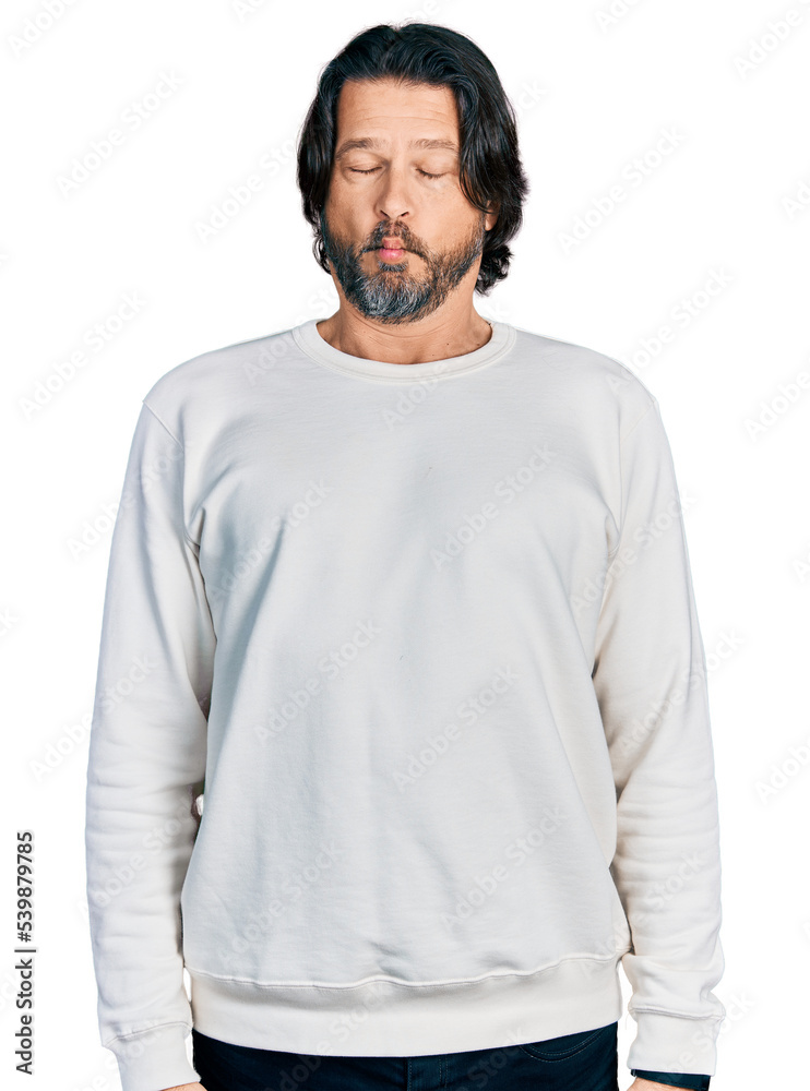Middle age caucasian man wearing casual clothes making fish face with lips, crazy and comical gesture. funny expression.