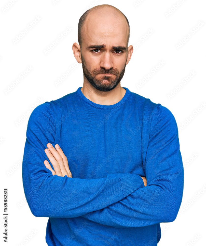 Obraz premium Young hispanic man wearing casual clothes skeptic and nervous, disapproving expression on face with crossed arms. negative person.