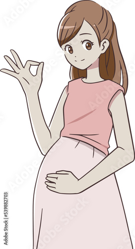 笑顔でOKマークをつくる妊婦