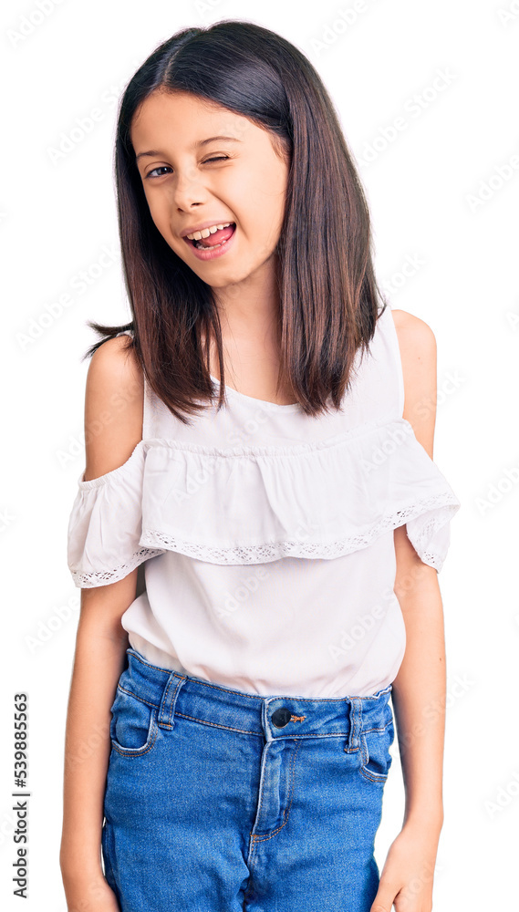 Obraz premium Beautiful child girl wearing casual clothes winking looking at the camera with sexy expression, cheerful and happy face.