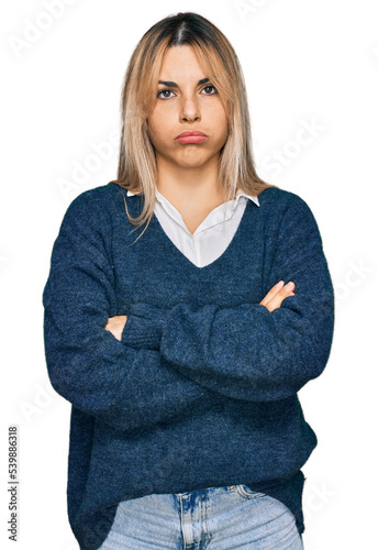 Young caucasian woman wearing casual clothes skeptic and nervous, disapproving expression on face with crossed arms. negative person.