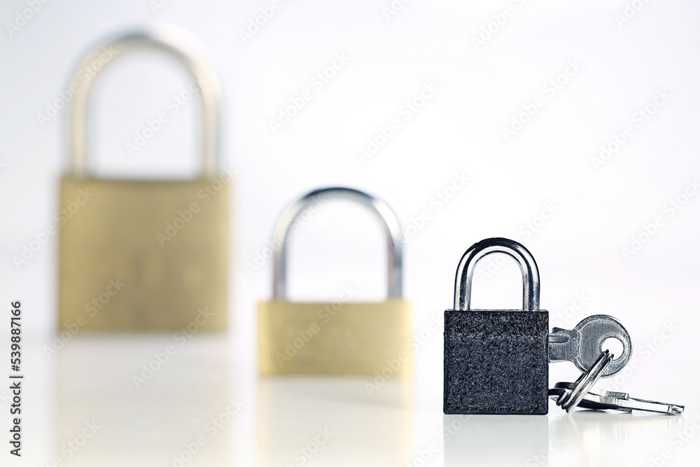 Close up key and lock on white background. Close up key and lock on white background.