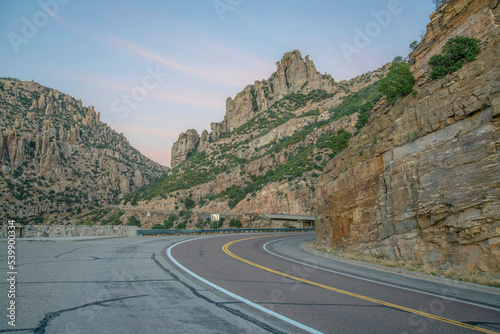 Winding road in scenic Mount Lemmon with cliffs and sky view in Arizona
