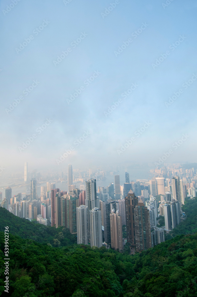 Vertical photo of Hong Kong skylines taken from Victoria Peak Viewpoint.