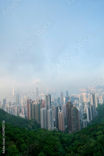 Vertical photo of Hong Kong skylines taken from Victoria Peak Viewpoint.