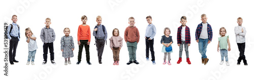 Lots of kids of all ages. Boys and girls. Isolated on white background. Full height. Panorama format. Set, collage.