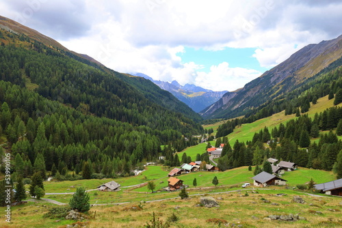 Sertig valley hiking trail leading from Bergün to Ravais lakes in Swiss Alps, Switzerland photo