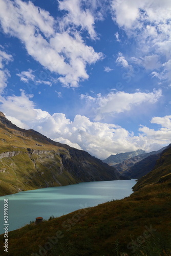 Mauvoisin reservoir located in Val de Bagnes, Valais with concrete arch dam, Switzerland © Tom