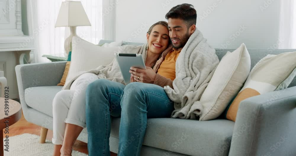 Couple, happy or tablet for communication, networking or social media app at home. Movie, video or love man and woman relax in living room streaming online, internet or website with smile in house Couple, happy or tablet for communication, networking or social media app at home. Movie, video or love man and woman relax in living room streaming online, internet or website with smile in house