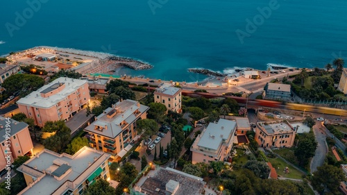 Landscape view of the coastal Genove city with the Italian Riviera nearby photo