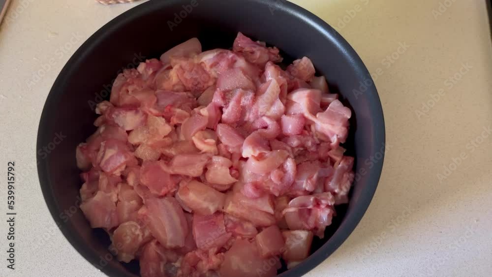 Sprinkle salt on sliced chicken pieces. Cooking Sprinkle salt on sliced chicken pieces. Cooking