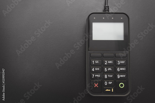 Payment terminal for credit card. Shopping. photo