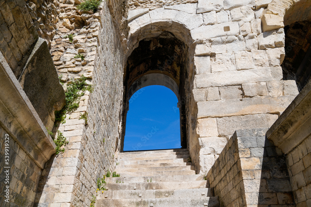 details ancient amphitheatre arena arch windows in Nimes