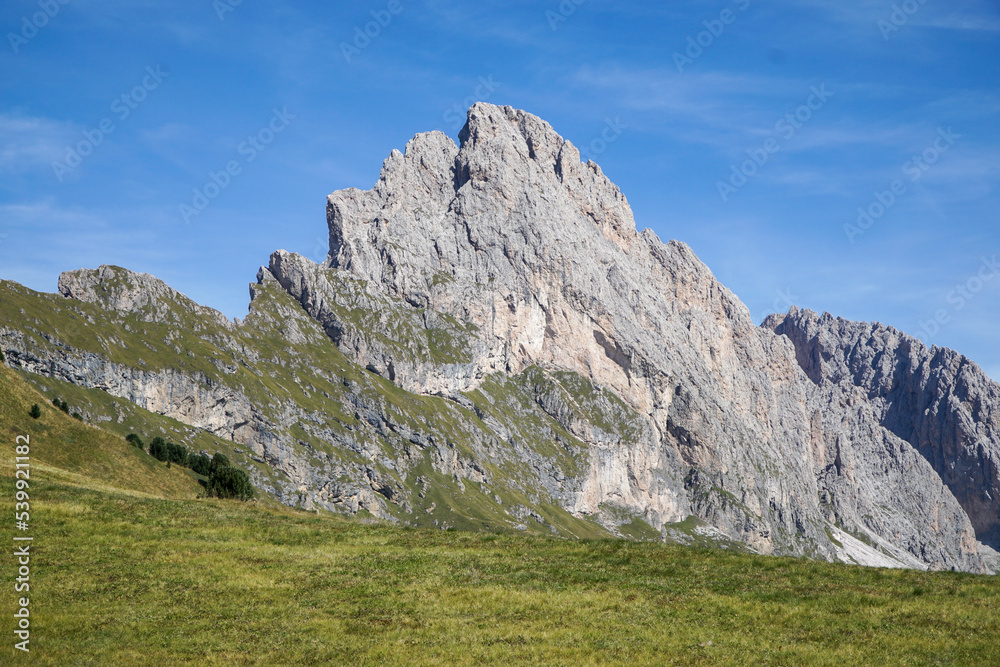Beautiful and distinctive Fermeda mountain in the italian dolomites. Perfect day for hiking with a wonderful clear blue sky. Gardena Valley, South Tyrol, Alto Adige, Italia.