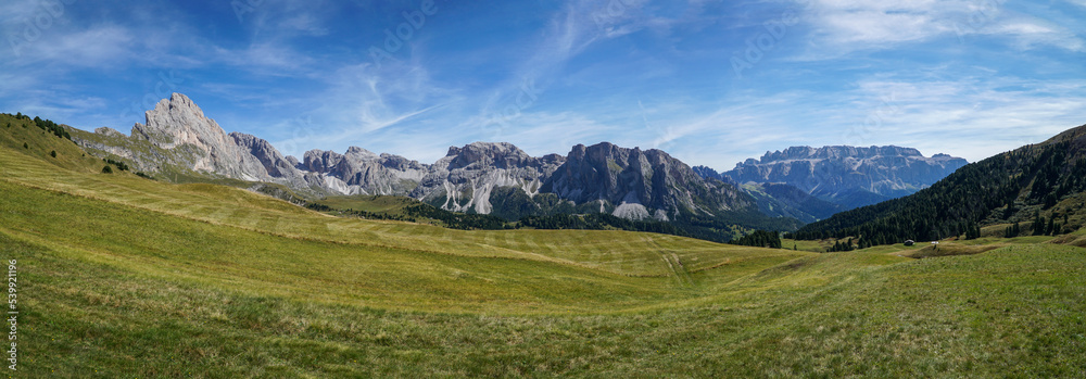 Amazing panoramic view in the dolomites: from seceda alp to sella group and sassolungo group and to world famous alp de siusi. south tyrol, italy, garda valley. puez odles nature park.