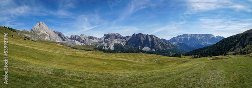 Amazing panoramic view in the dolomites: from seceda alp to sella group and sassolungo group and to world famous alp de siusi. south tyrol, italy, garda valley. puez odles nature park.