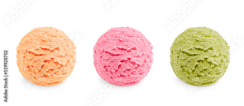 Three colorful scoops of cold sweet ice cream or gelato in assortment of different flavor of pink, green and beige color of vanila, berry and pistachio or mint taste isolated on white background