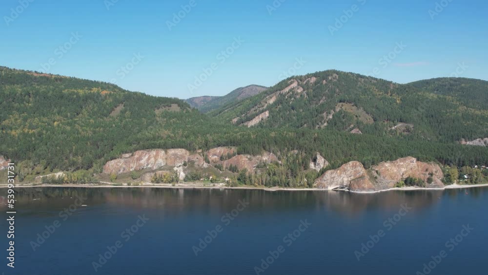 Beautiful landscape flight over the river bank with rocks, aerial shot Beautiful landscape flight over the river bank with rocks, aerial shot