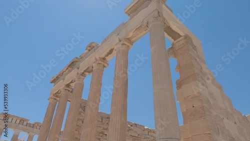 Panning shot of the large columns within the Pandroseion photo