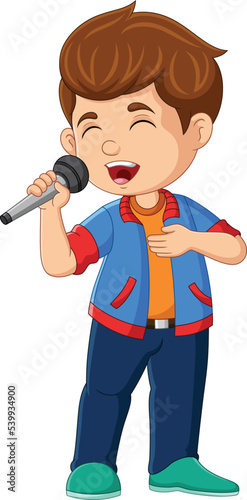 Cute little boy singing with the mic