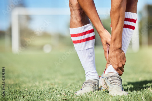 Tableau sur toile Soccer, sports and ankle pain, injury or accident on a field during a game, exercise or training