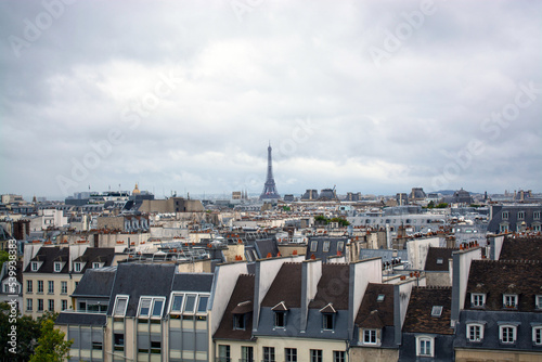 Paris cityscape with Eiffel Tower view on a cloudy day
