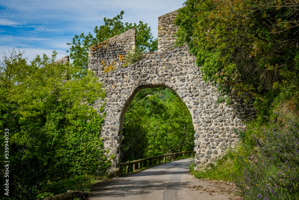 Gate in the the medieval ramparts surrounding the vilage of Rochemaure in the South of France (Ardeche)