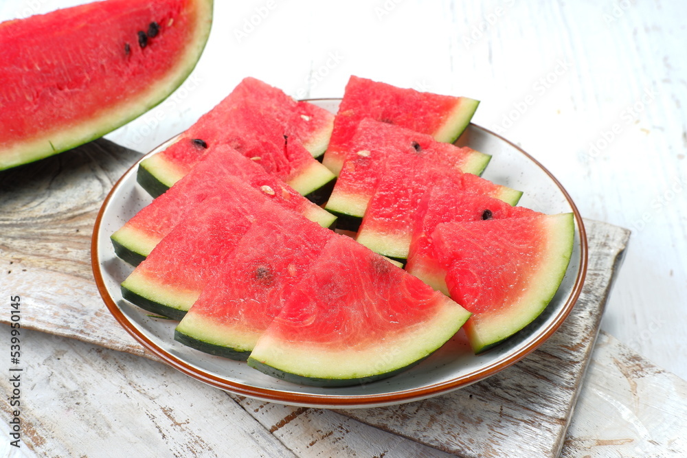 Fresh ripe sliced watermelon on white background Fresh ripe sliced watermelon on white background