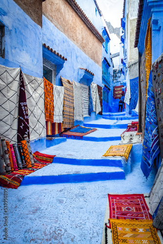 carpets, narrow street in Chefchaouen, blue, morocco, north africa © Andrea Aigner