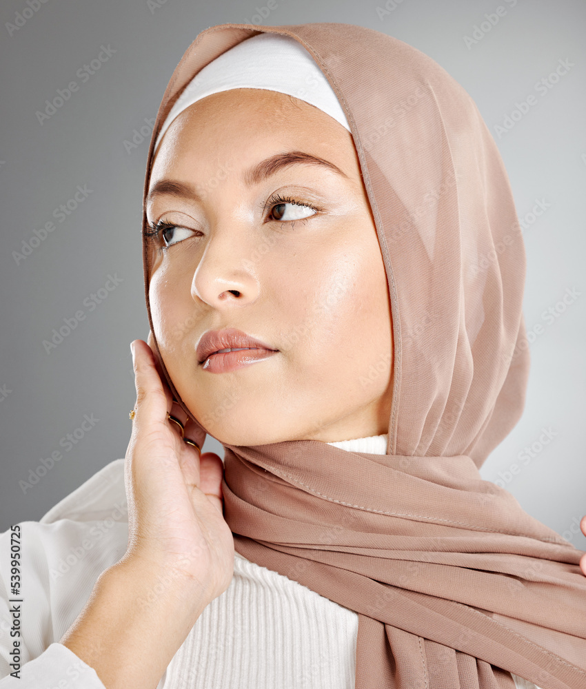 Hijab fashion, muslim woman beauty and skincare, makeup and aesthetic cosmetics on studio background. Islamic religion, brown scarf and face headshot of young Saudi Arabia girl, culture and elegance Hijab fashion, muslim woman beauty and skincare, makeup and aesthetic cosmetics on studio background. Islamic religion, brown scarf and face headshot of young Saudi Arabia girl, culture and elegance