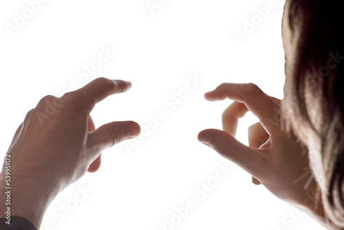 Hands are held with fingers. Man's hands.