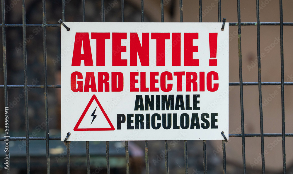 Electric guard warning in romanian language sign in the Zoo