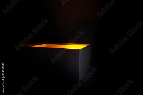 black box with orange light