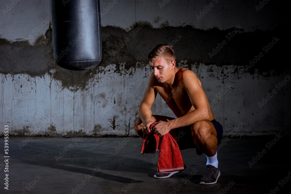 Sport man resting after a hard workout