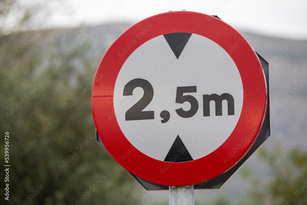 Road Sign: Vehicle height restrictions, No vehicles over maximum height shown in meters. Road Sign: Vehicle height restrictions, No vehicles over maximum height shown in meters.