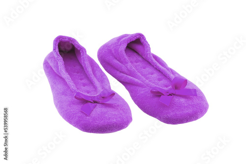 Slippers isolated. Close-up of a pair of female pink warm and soft cosy terry slippers isolated on white background. Womans shoes.
