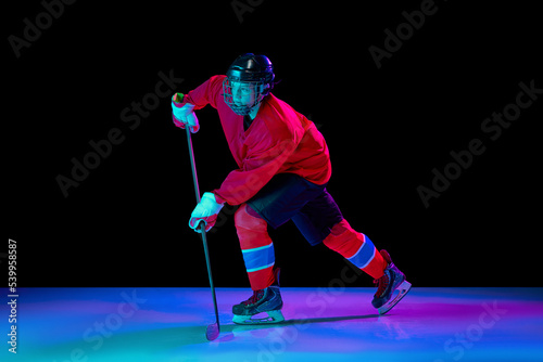 Photography Training of male ice hockey player wearing hockey jersey, uniform and sports hel