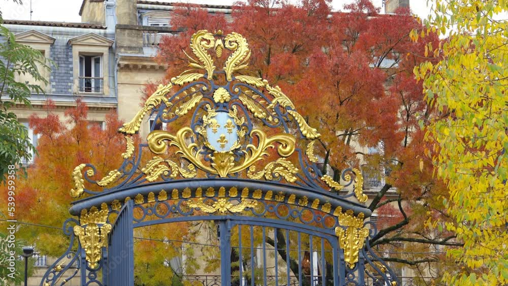 Golden entrance portal of the Jardin Public park on an Autumn day in Bordeaux, France Golden entrance portal of the Jardin Public park on an Autumn day in Bordeaux, France