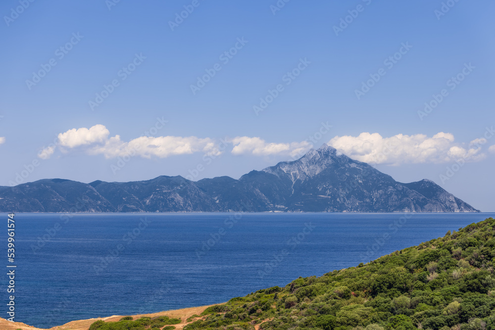 Slhouette of Mount Athos and the peninsula of the same name protruded into the Aegean Sea. Chalkidiki, Greece.