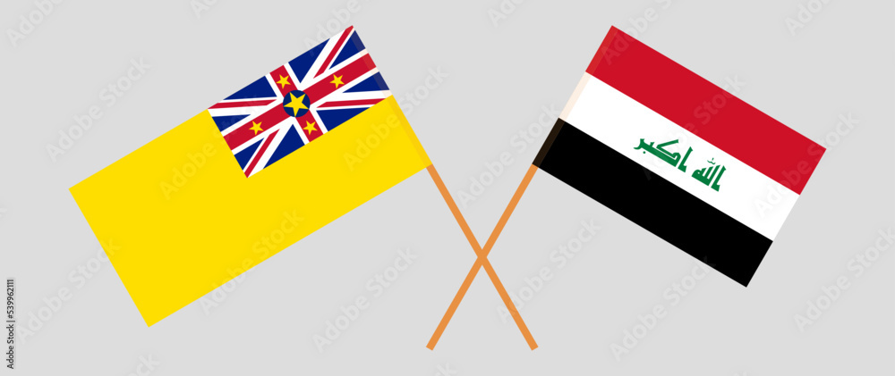 Crossed flags of Niue and Iraq. Official colors. Correct proportion