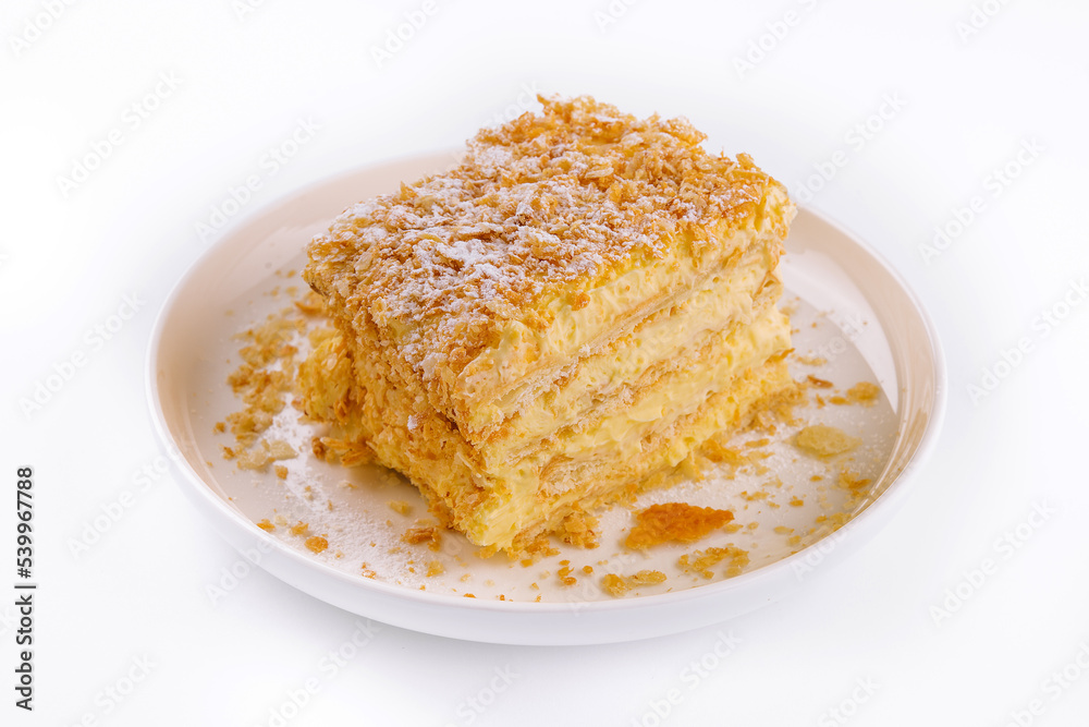 Homemade baked cake Napoleon on plate Homemade baked cake Napoleon on plate