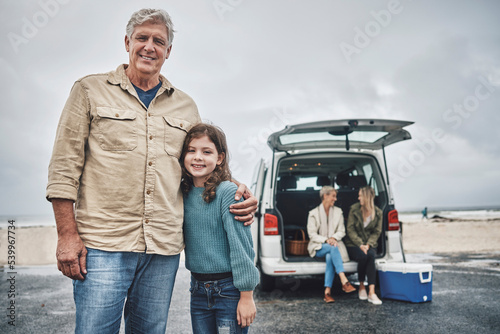 Big family, grandfather and girl on beach road trip, holiday or vacation. Happy family portrait, love and van trip outdoors, having fun and spending time together, talking or bonding, care or support #539967734