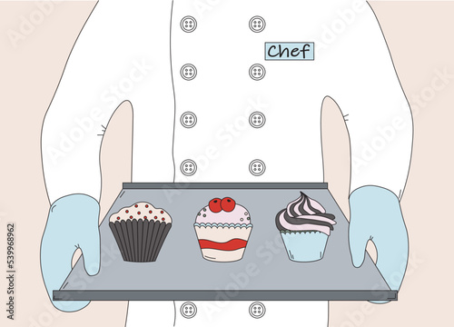 the cook in gloves and with a baking sheet prepared cupcakes