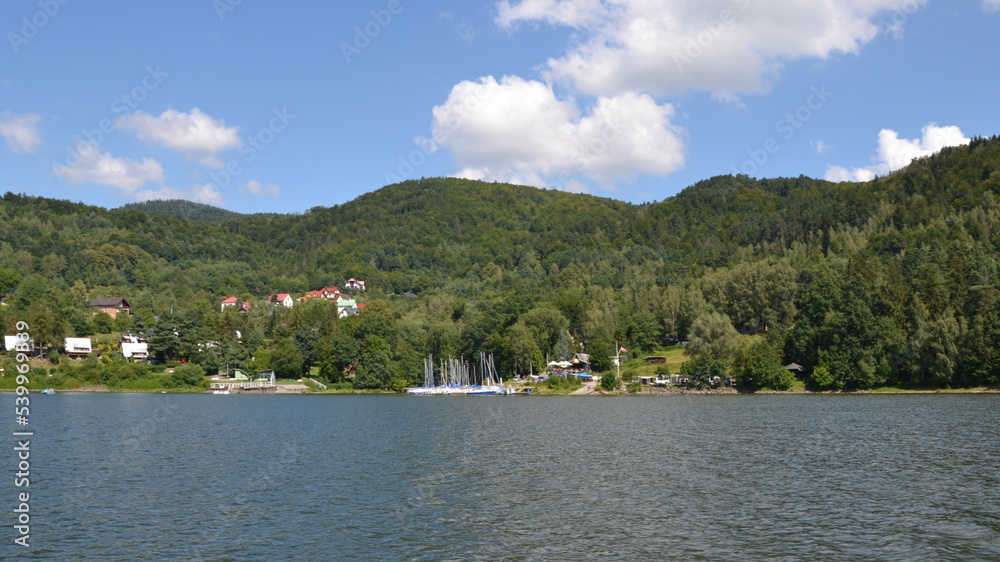 Zywiec Lake, Poland. Zywiec Lake (Polish: Jezioro Zywieckie) is a reservoir on the Sola river in southern Poland, near the town of Zywiec