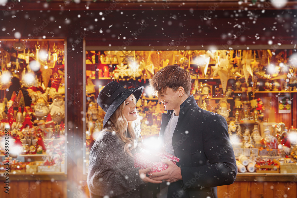  Couple outdoor in winter.  christmas - a couple celebrates together at the christmas market