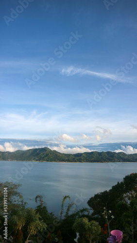 stunning lake tondano surrounded by beautiful hills