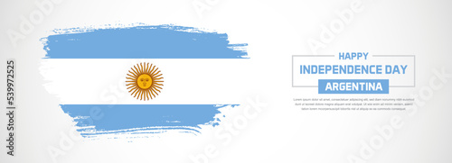 Abstract flag of Argentina on hand drawn brush strokes. Happy Independence Day with grunge style vector background