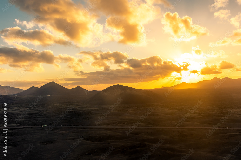 Beautiful sunset over the Volcanos National Park in Lanzarote, Canary Islands, Spain Beautiful sunset over the Volcanos National Park in Lanzarote, Canary Islands, Spain