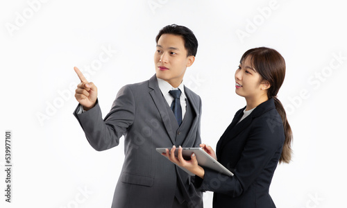 Asian businessman touching and talking and working with secretary white background. 